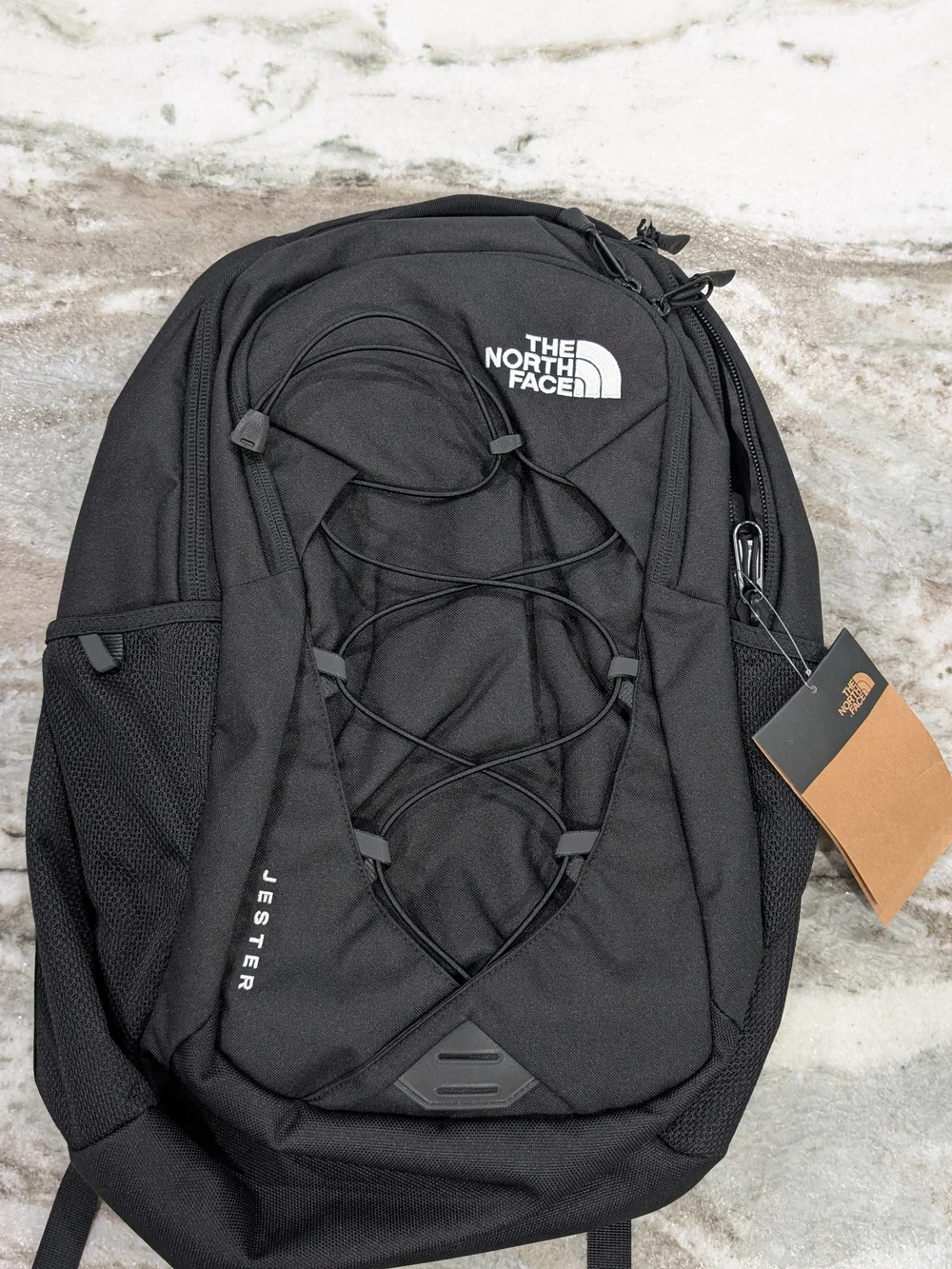 The North Face Jester Backpack in Black with White Logo